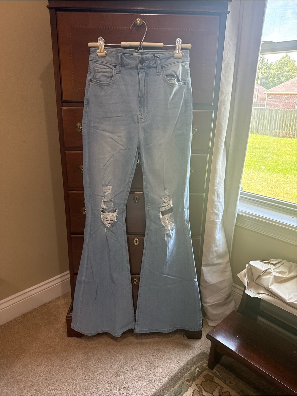 Hidden Distressed Flare Jeans